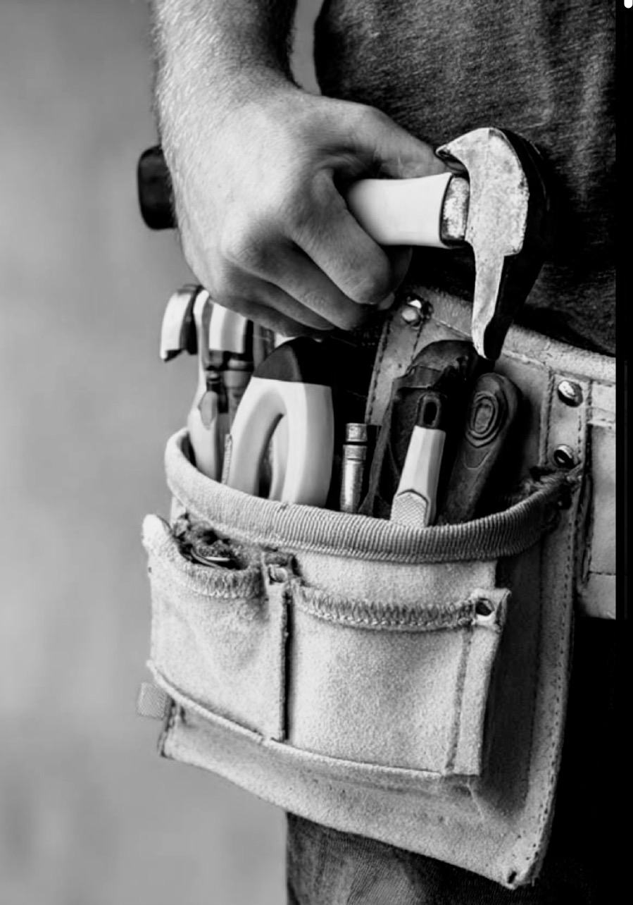 Tradesperson with tool belt